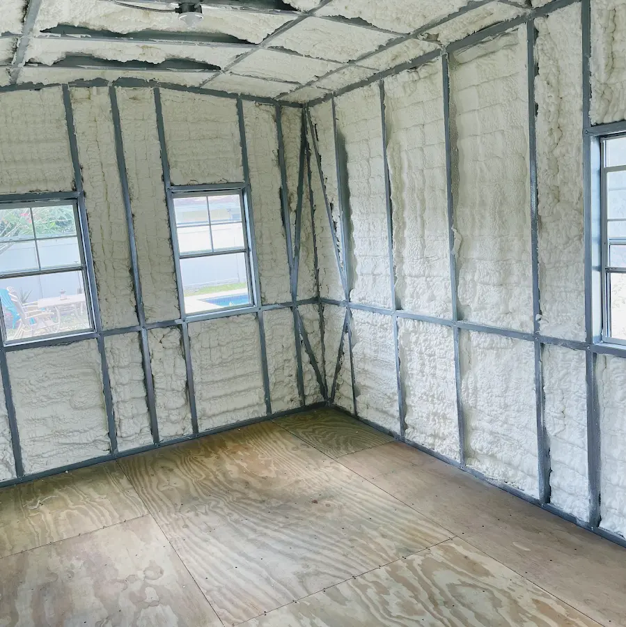 Closed-cell spray foam insulation applied to wall cavities in a residential project in South Riding